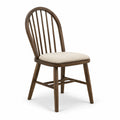 Chaise en bois marron avec coussin en tissu beige